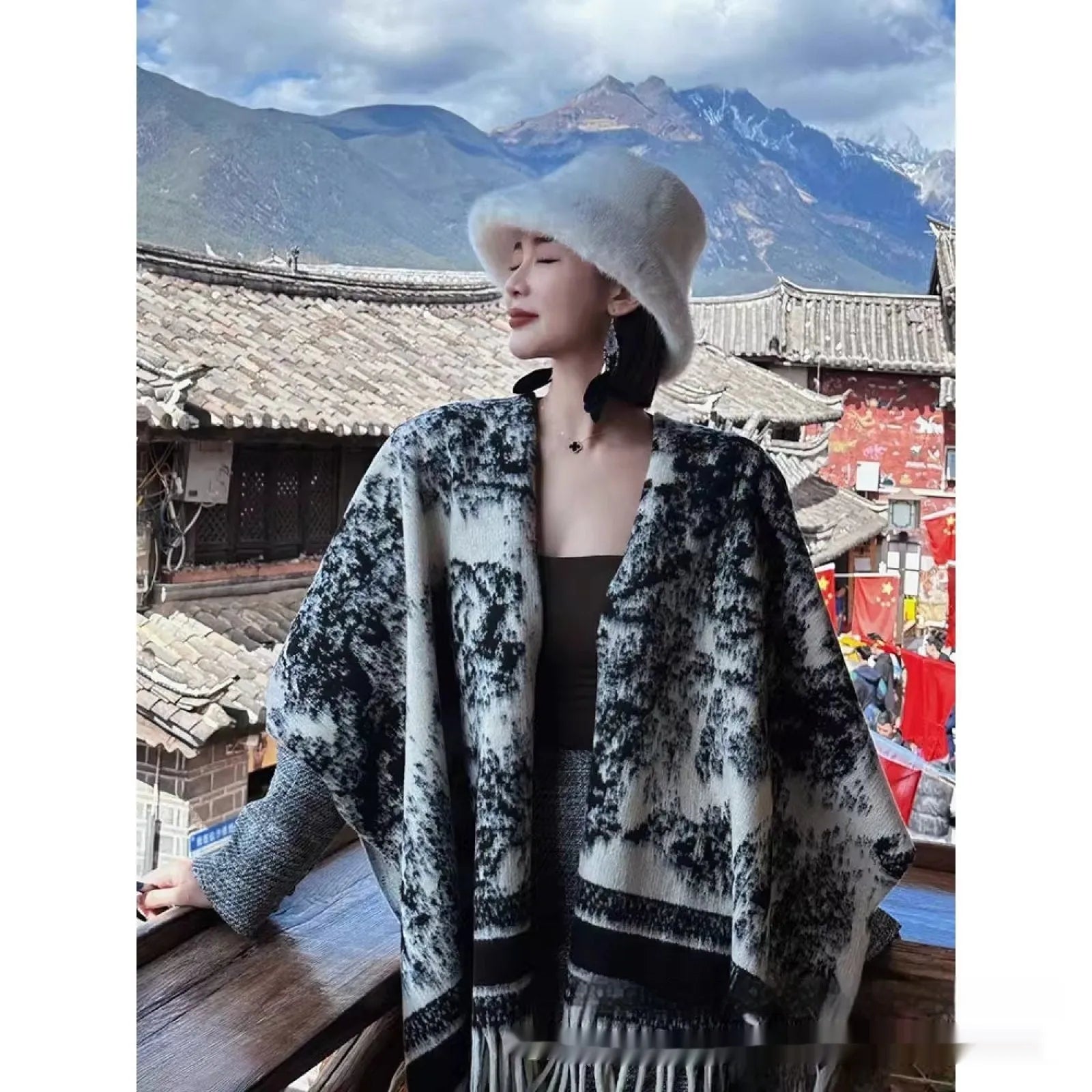 Women's polyester scarf cape with tassel edges in shawl style, shown in one of five available colours