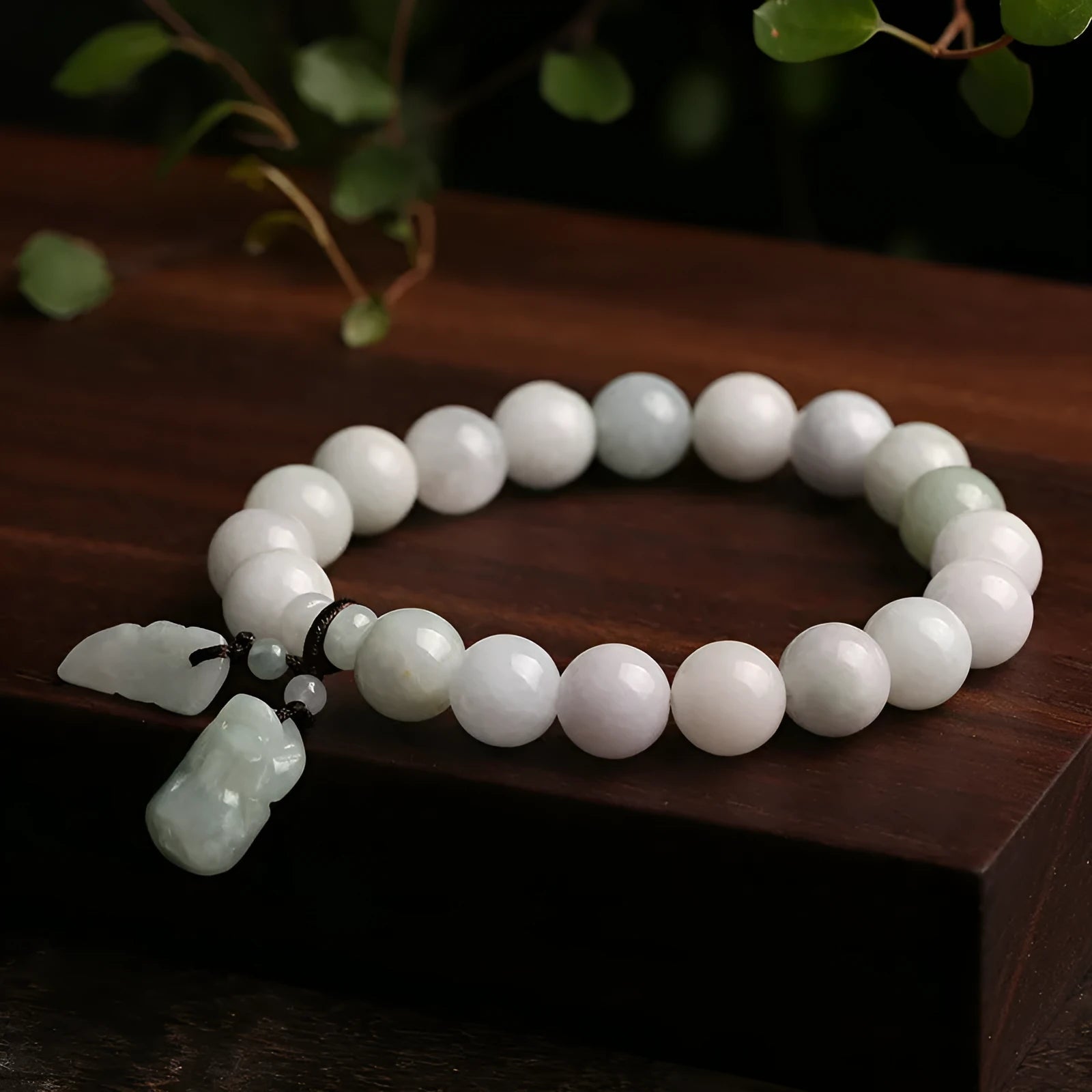 Natural jade bracelet with geometric hanging design and Buddhist elements including Maitreya Buddha motif
