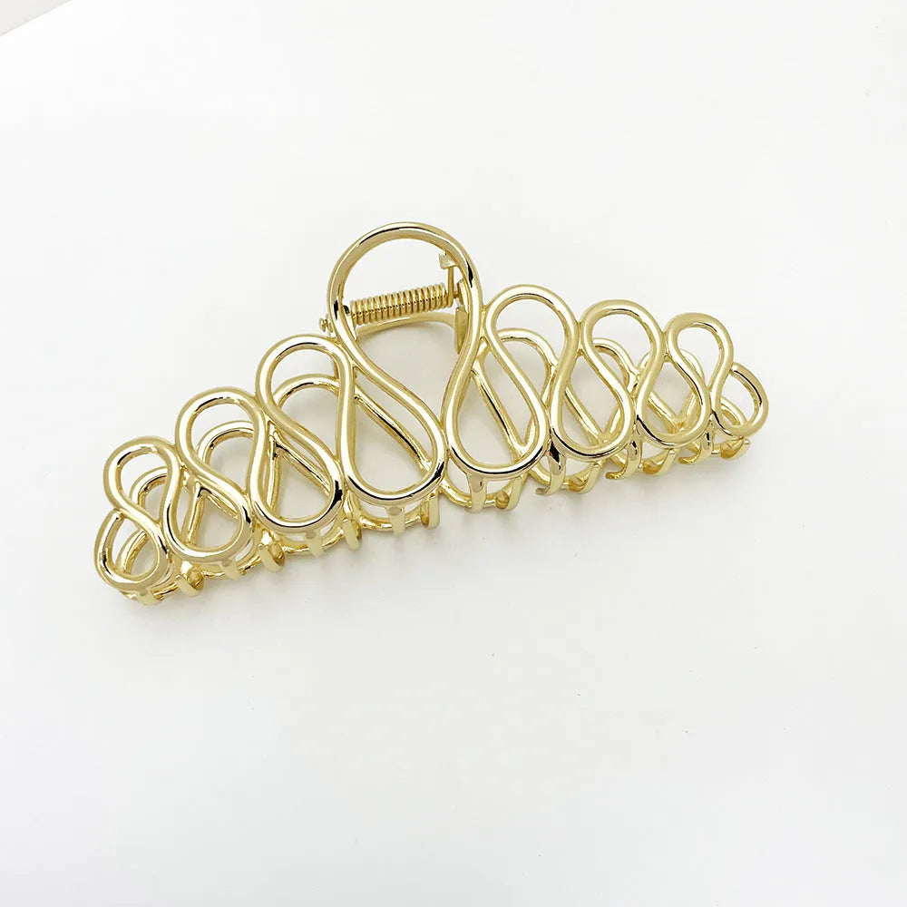 Minimalist large alloy hair clip with electroplated gold or silver finish and tassel detailing for thick hair