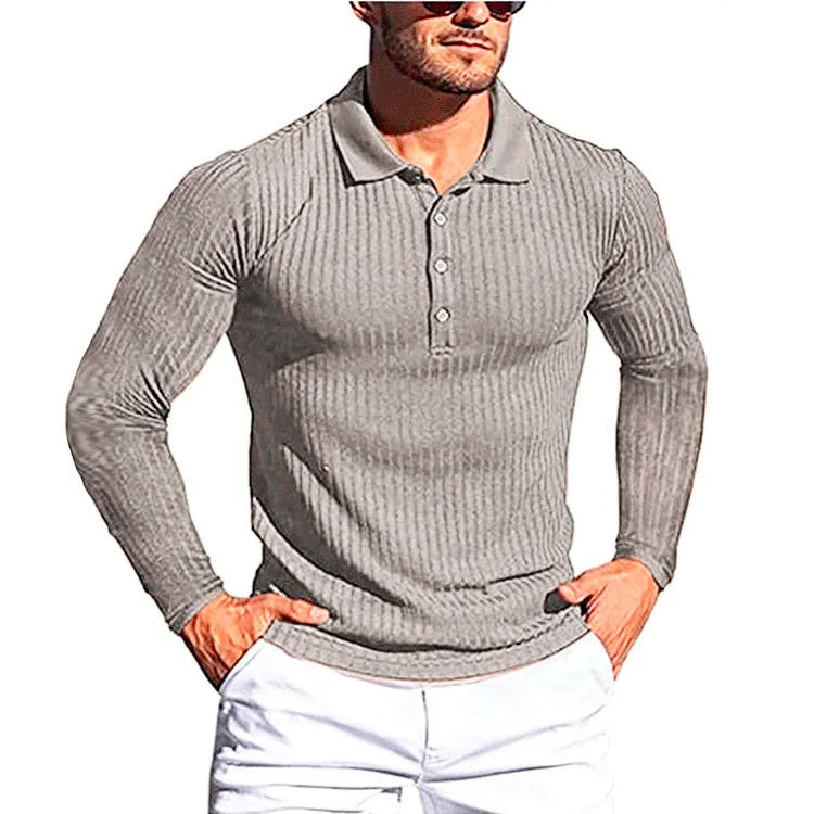 Man wearing a loose-fitting, striped, short-sleeve polyester shirt in a neutral colour.