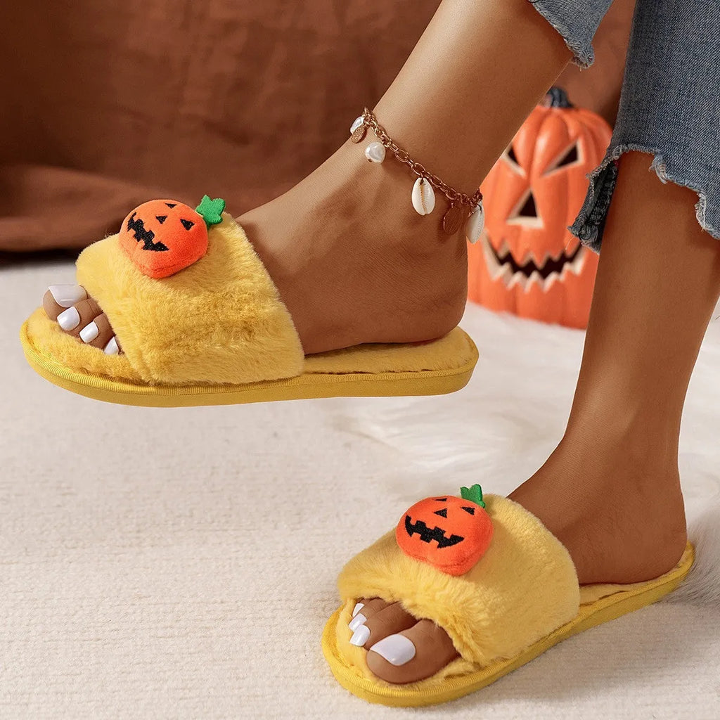 Women's Halloween pumpkin plush slippers in white and yellow with synthetic fur upper