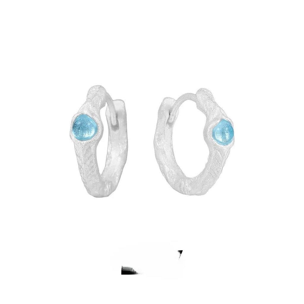 925 sterling silver ear clips with burnt silver finish and geometric circular design