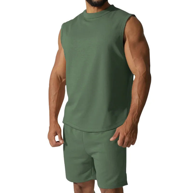 Men's sleeveless cotton blend sports top and matching shorts in solid colour options