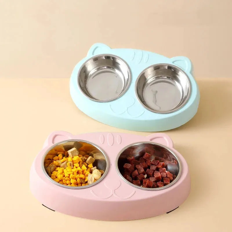Blue macaron-styled double bowl plastic feeder tray for cats and dogs on a wooden floor.
