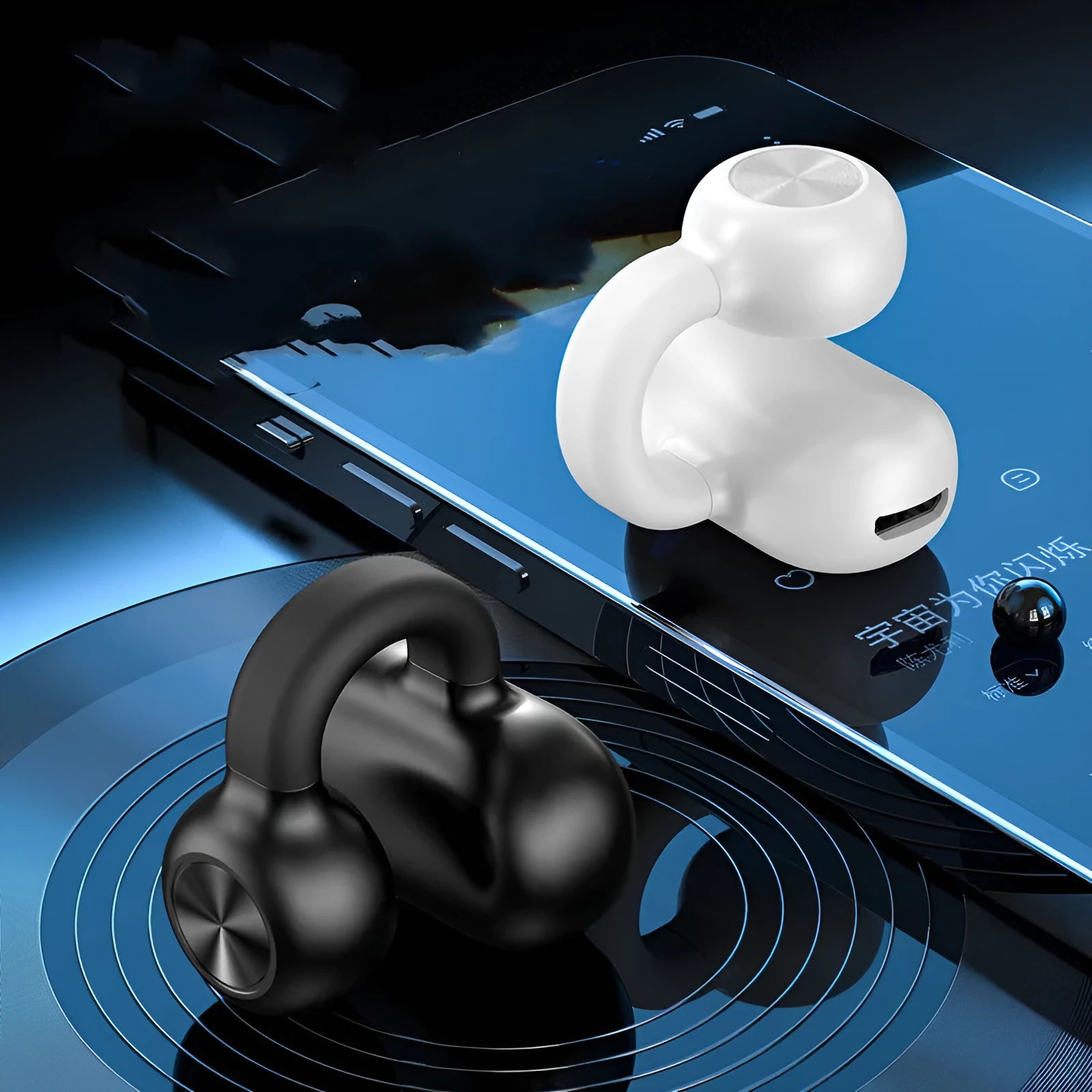 Black and white wireless Bluetooth bone conduction headset with clip-on design for exercise use