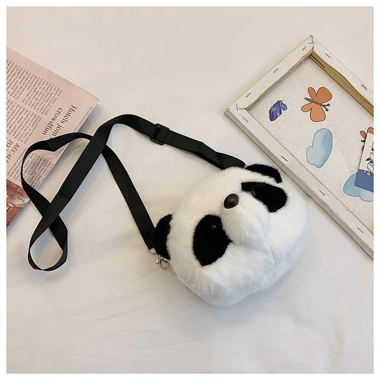 Plush crossbody shoulder bag with panda head pattern and cylindrical shape