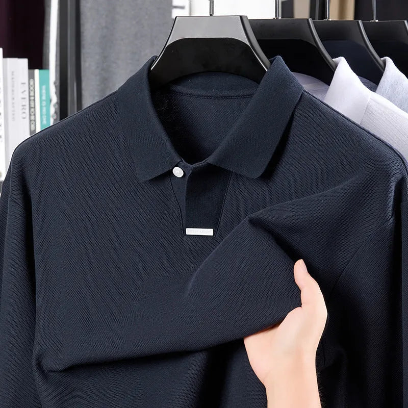 Men's grey loose fit cotton polo shirt with lapel collar and long sleeves on a hanger