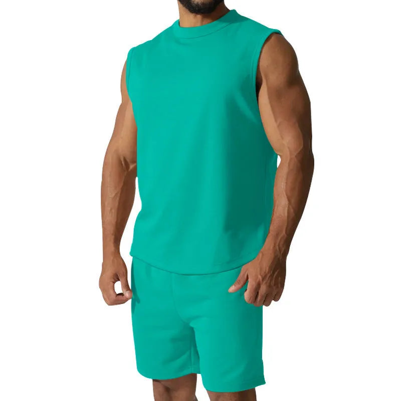 Men's sleeveless cotton blend sports top and matching shorts in solid colour options
