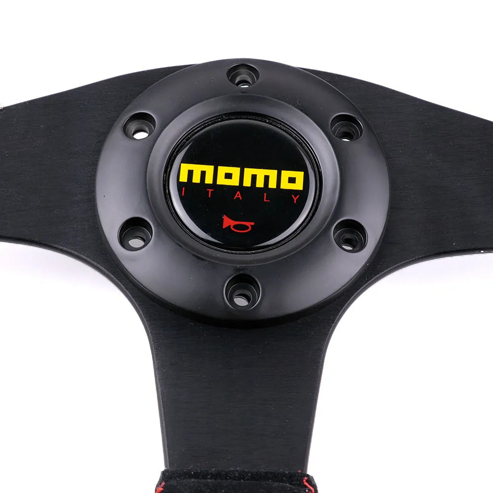 13 inch BRIDE microfiber leather flat steering wheel on black bracket with screw holes visible