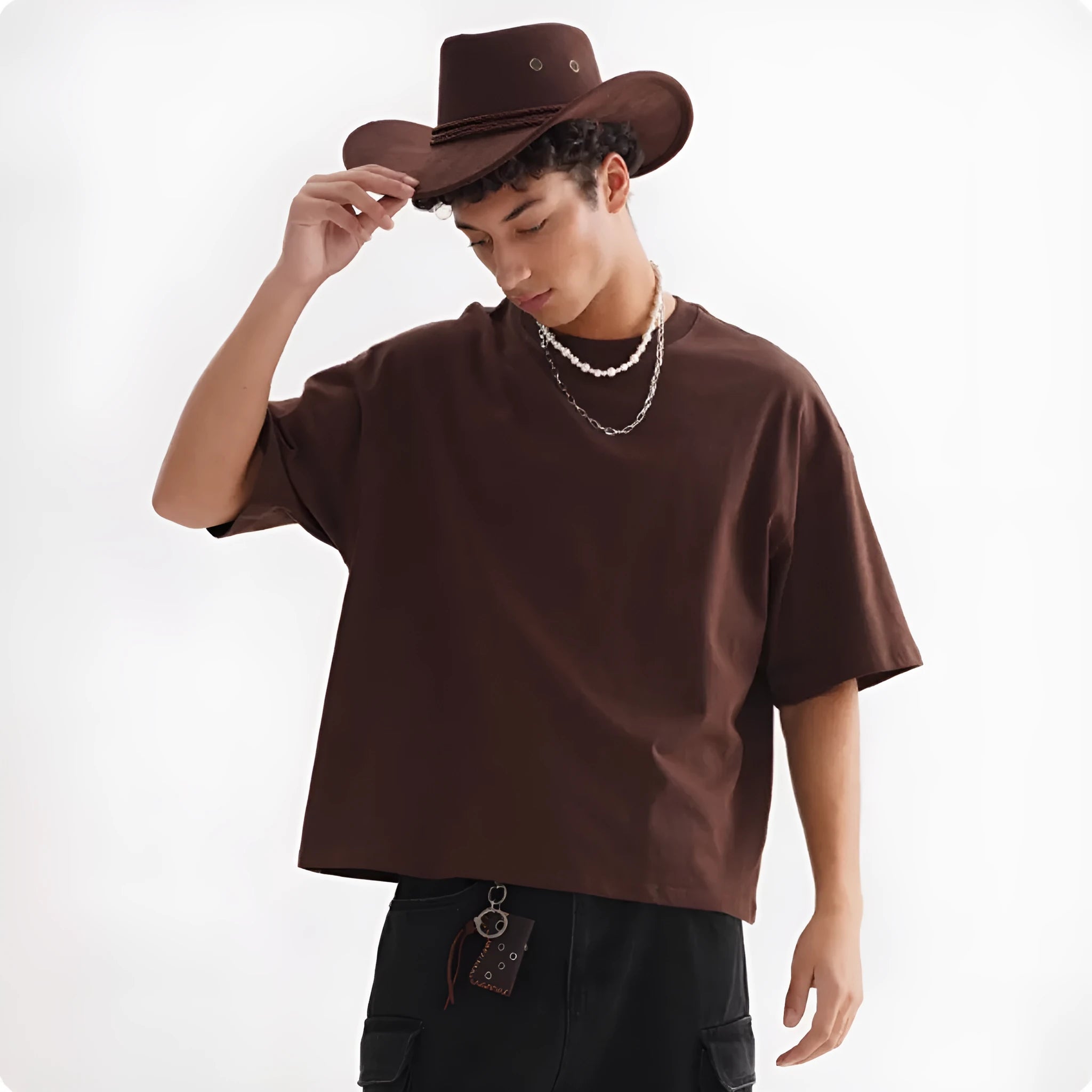Men's loose fit pure cotton American style T-shirt in apricot colour on a hanger