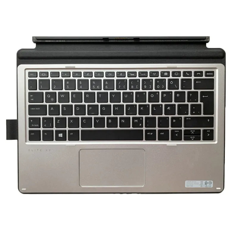 Wireless tablet keyboard on a desk next to an Elite X2 tablet, showing multimedia keys.