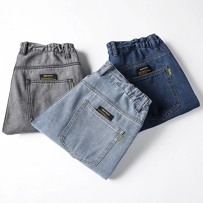 Men's loose straight casual jeans in dark blue, light blue and grey colours with mid waist design