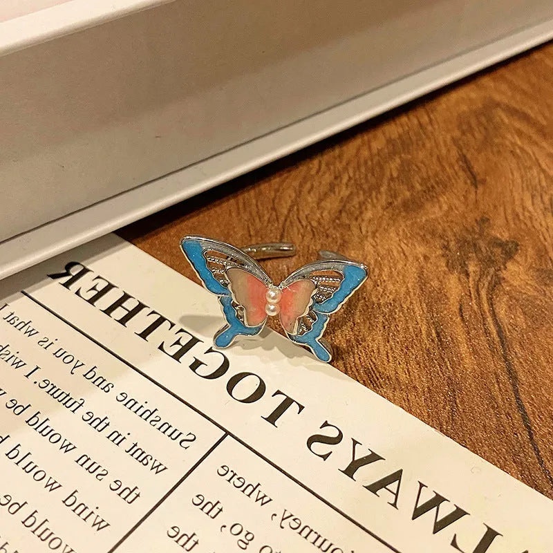 Adjustable open-loop copper butterfly ring for women with intricate design