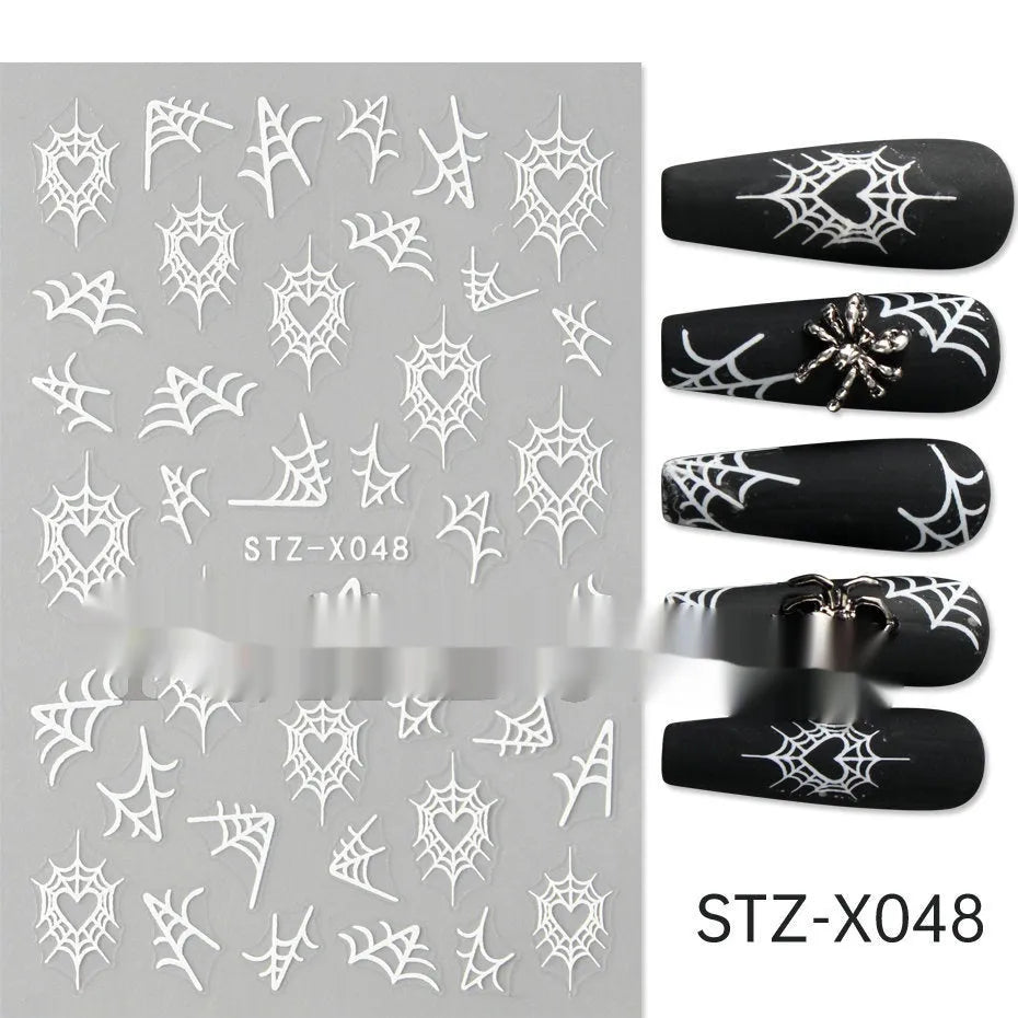 Sheet of black and silver love heart pattern nail art stickers with a plastic nail patch.