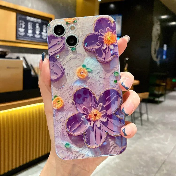 Purple and yellow mobile phone cases with oil painting floral design and inlaid diamond decoration.