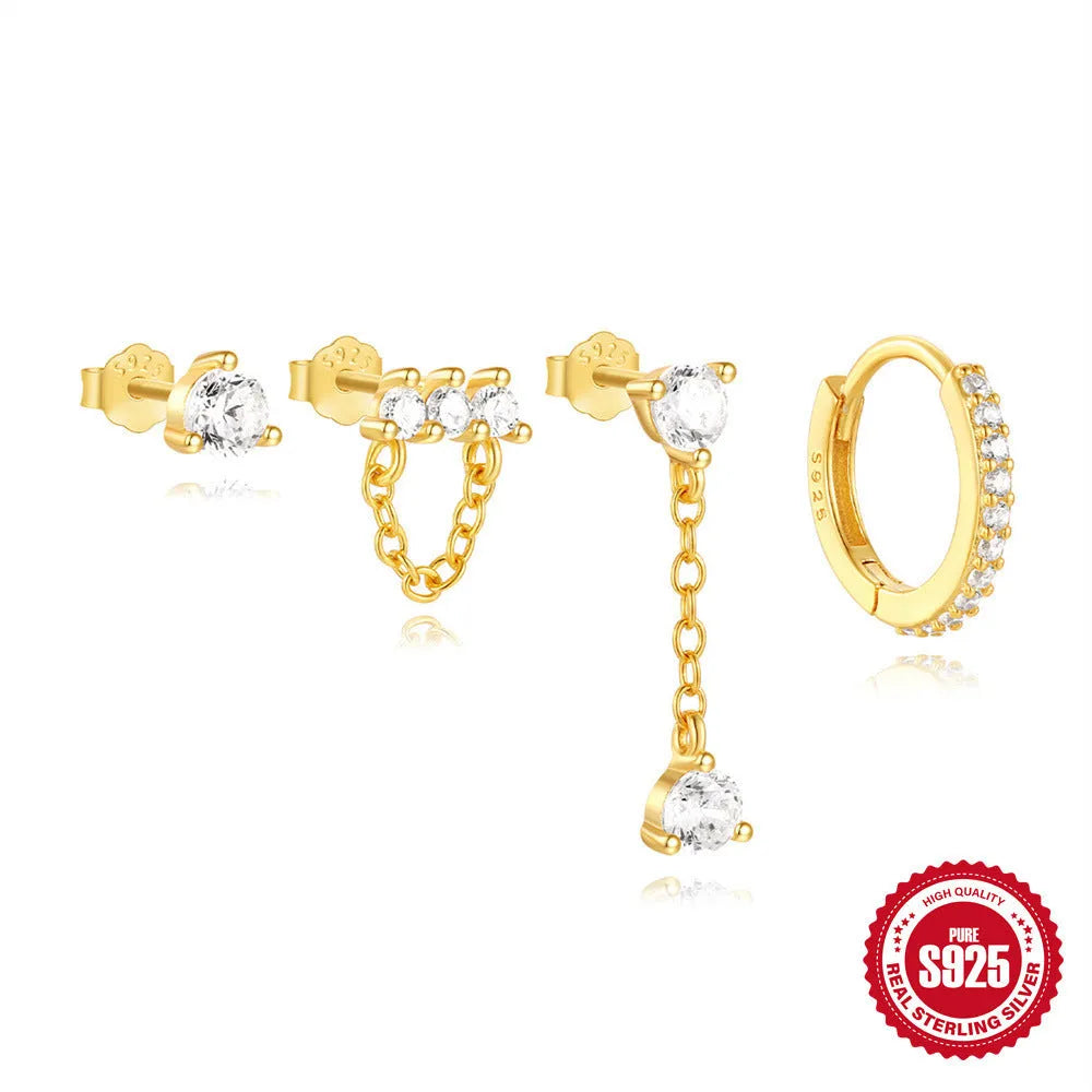A pair of geometric clover petal earrings made of S925 sterling silver with a gold electroplated finish.