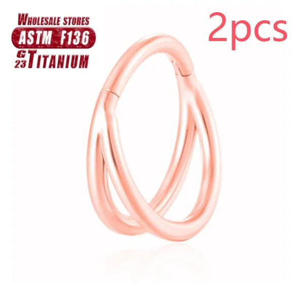 Titanium alloy nose ring in silver, available in plain or diamond-set styles and multiple lengths.