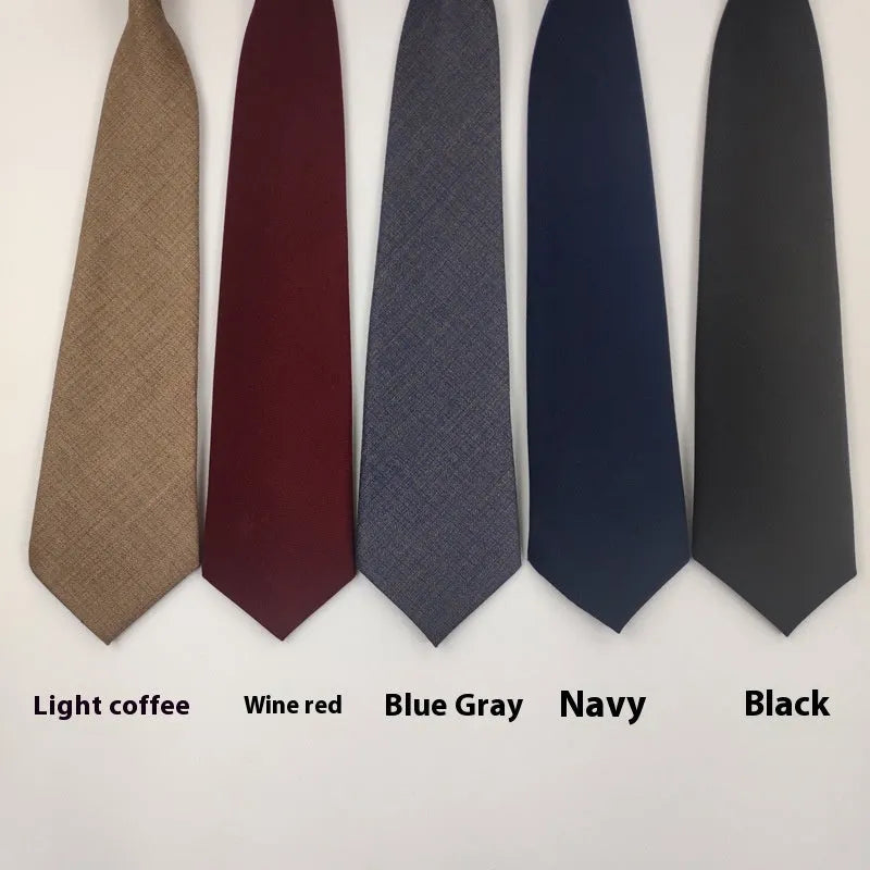 Men's solid colour cotton bow tie in arrow style, showing navy blue colour option.