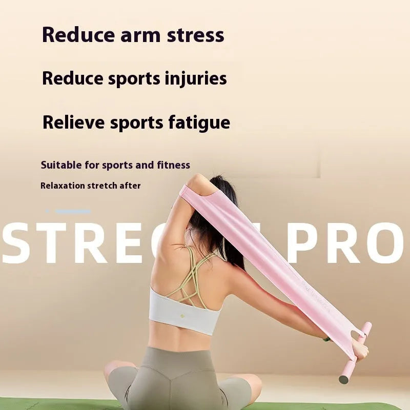 Grey and pink multi-function yoga stretching tool for shoulder, back and hip exercises.
