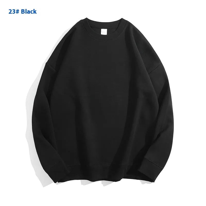 A loose-fitting, off shoulder, round neck cotton sweater in a solid colour with long sleeves.