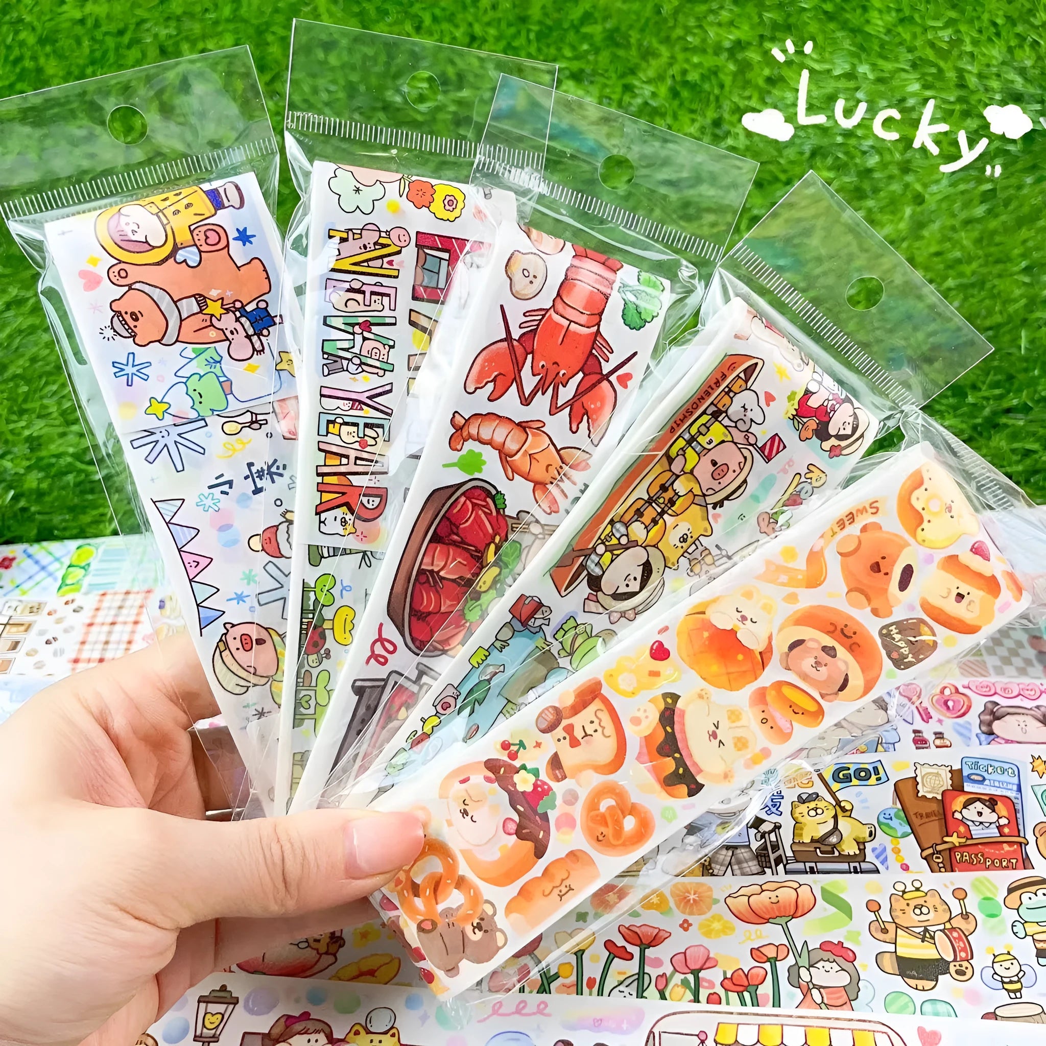 Sheet of cute cartoon character stickers printed on Japanese paper for stationery decoration.
