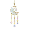 K9 crystal moon pendant hanging from a car rear-view mirror in sky blue colour