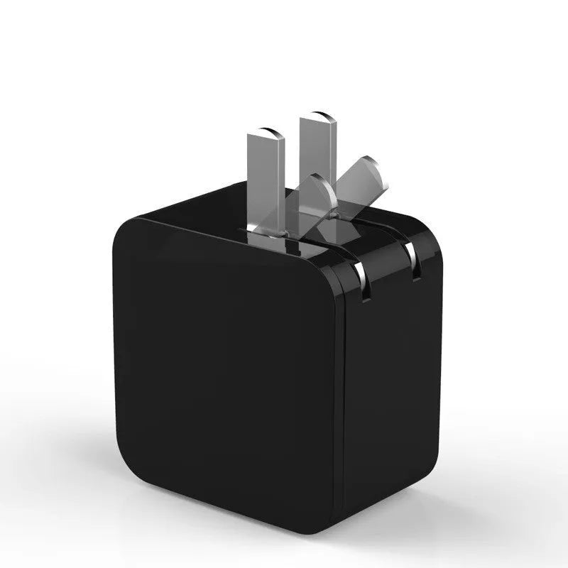 Black and white dual USB travel charger with digital display showing EU and US plug options.