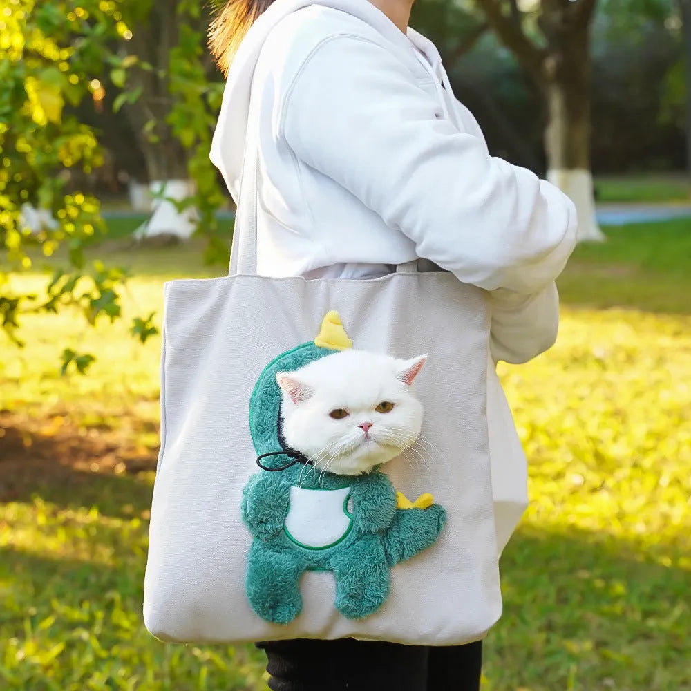 Soft canvas pet shoulder bag with cartoon pattern for small dog or cat carrier.