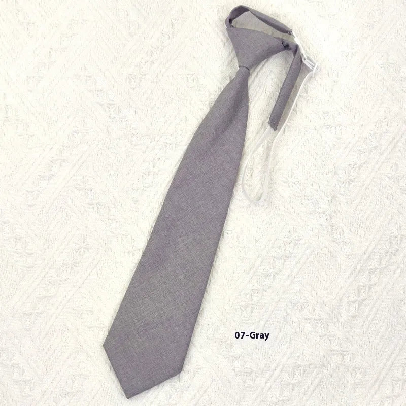 Men's solid colour cotton bow tie in arrow style, showing navy blue colour option.