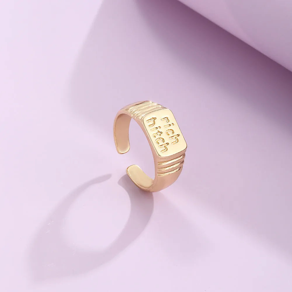 Four vintage alloy heart cutout letter rings in electroplated JH1084 colour set