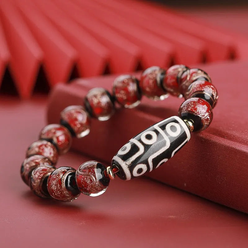Ancient Chinese style coloured glaze bracelet with snake motif and multi-colour beads
