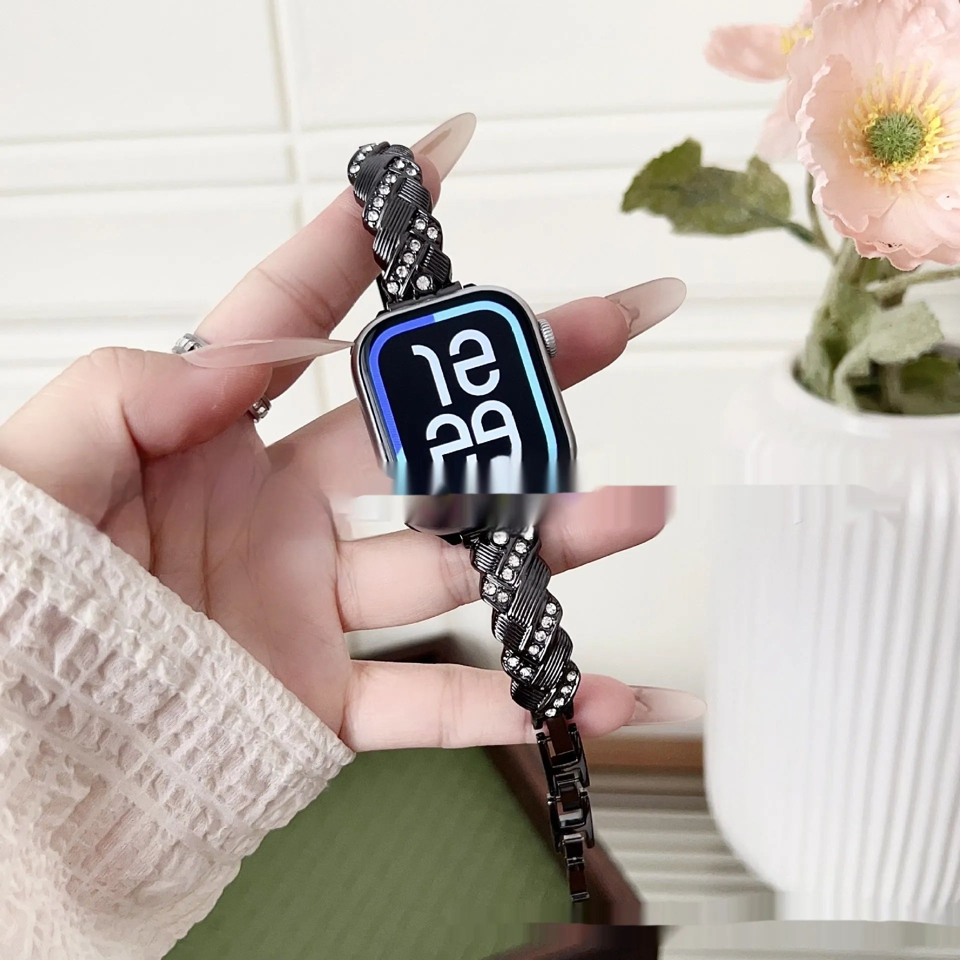 Zinc alloy Apple Watch strap with diamond twist design in silver, rose gold, gold, black, and Starlight colours.
