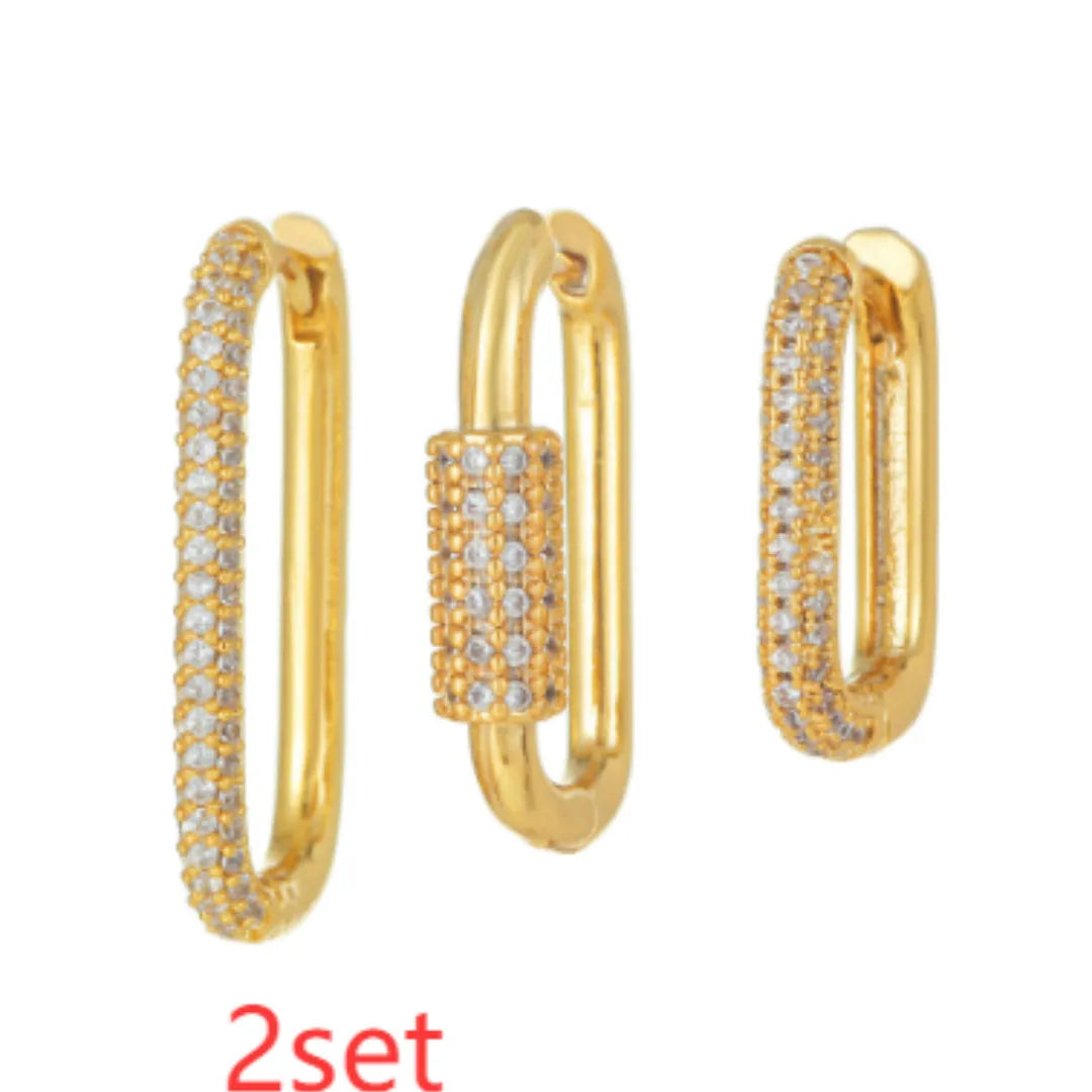 Three geometric copper ear clips with micro inlaid zircon treatment in gold and white colours