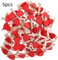 Set of five handmade solid wood heart-shaped clips in red, white, yellow, pink, and rose red.