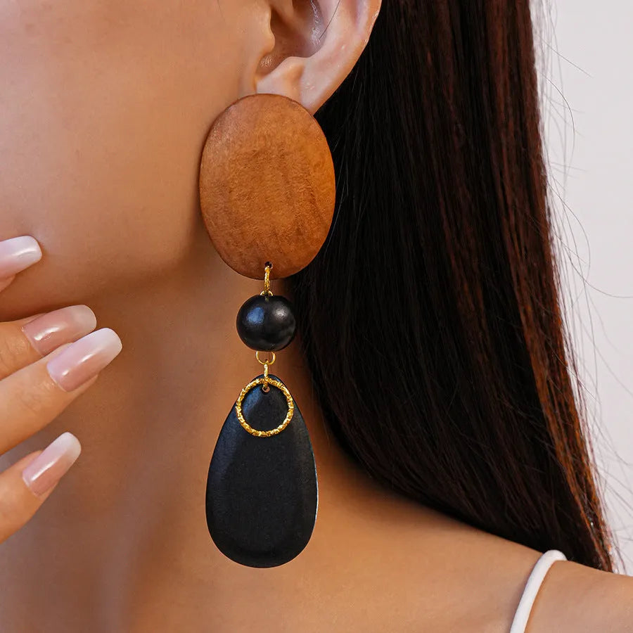 Wooden retro fashion earrings with elliptical shape and silver-brown-black colour combination