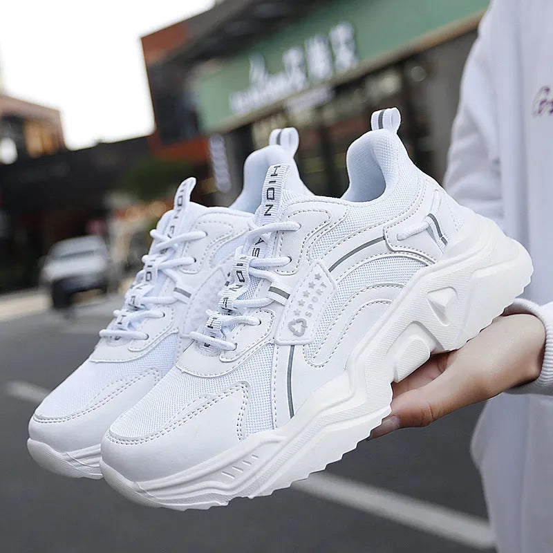 Women's thick-soled casual sports shoes with mesh upper and buckle details in moonlight colour
