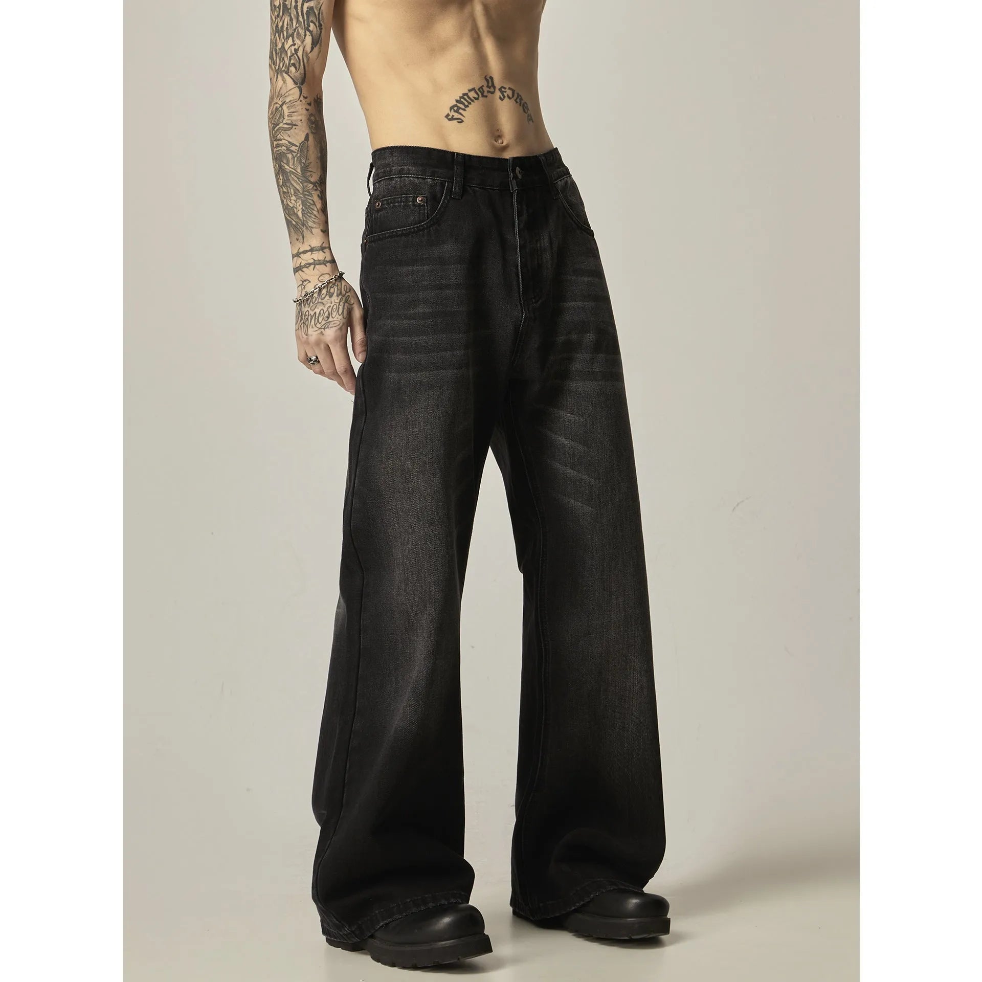 Black retro straight-leg jeans with zip fly opening and loose fit on size chart
