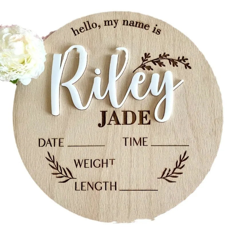 Square 15cm wooden baby name plaque with birth details displayed, shown in three style options.