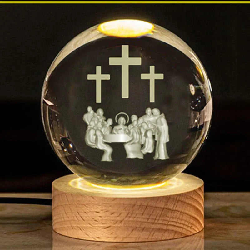 White crystal ball with cross and religious symbols on wooden LED base desk ornament