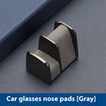 Zinc alloy and leather sunglasses clip for car dashboard storage in four colour options.