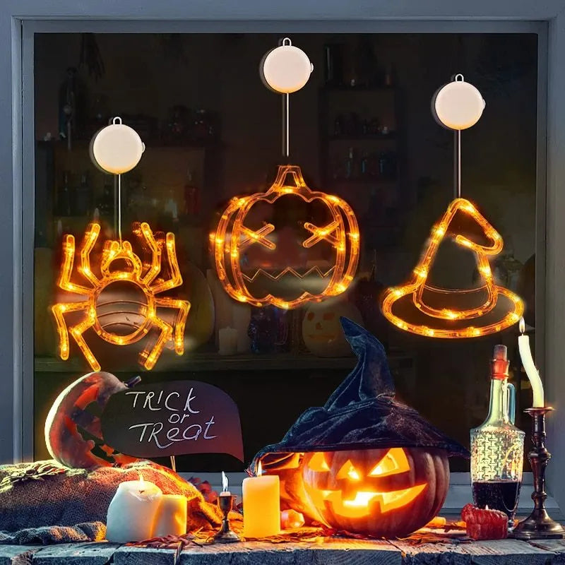 Halloween window hanging LED lights with suction cups showing multiple horror-themed designs powered by batteries