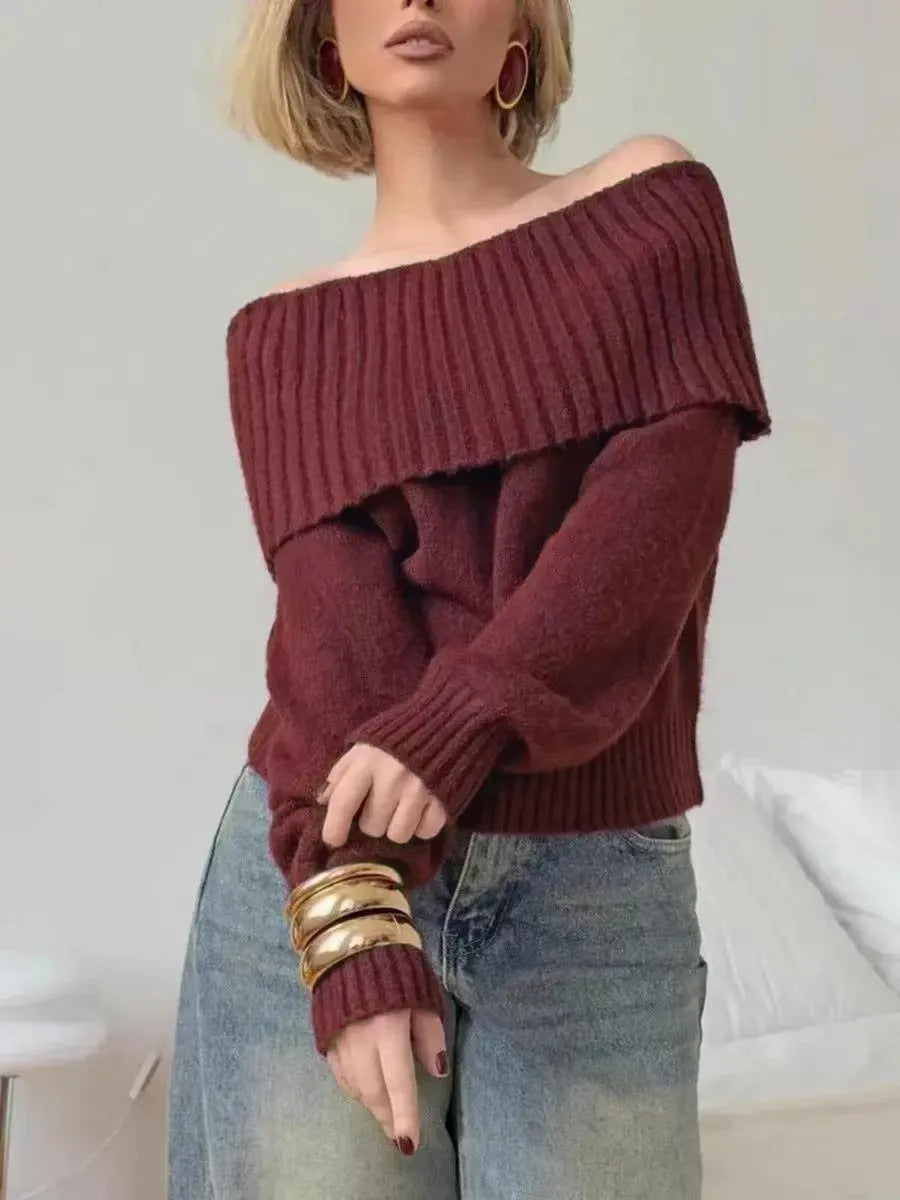 Grey off-the-shoulder sweater with a 3D pattern texture, showing strapless neckline design.