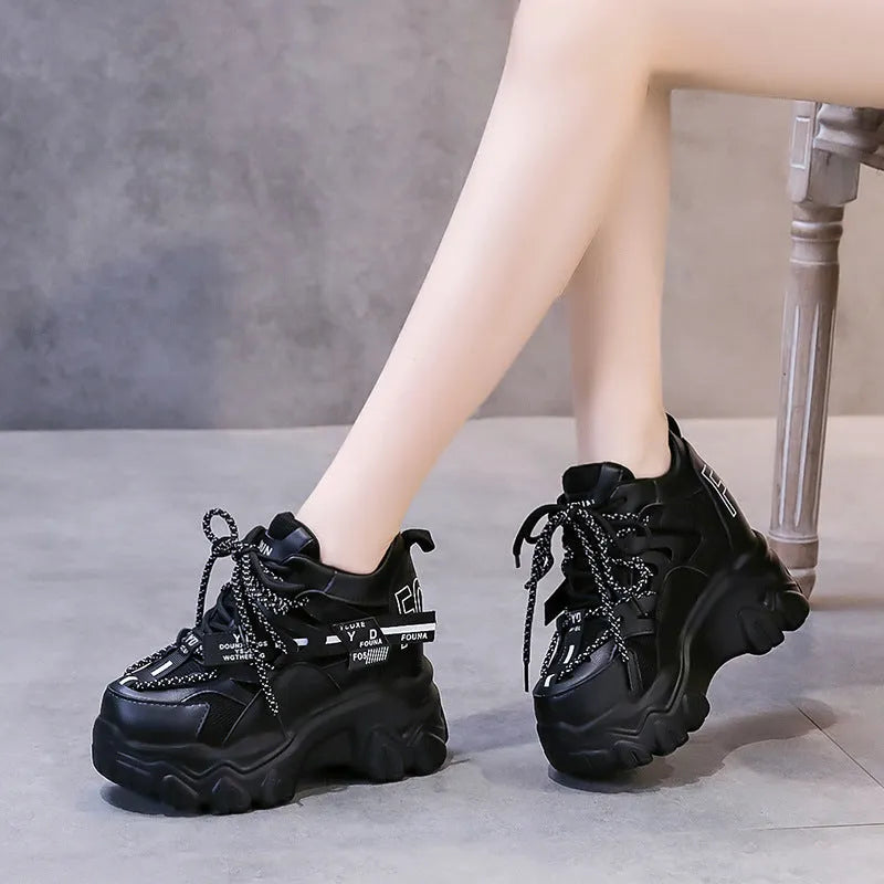 Women's white and black mesh platform sports shoes with cross-strap design and 6-8cm heel
