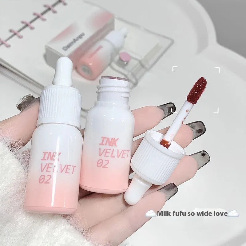 Mirror Lip Lacquer tube in 3.5g size showing four shade options from Milk Huhoo series