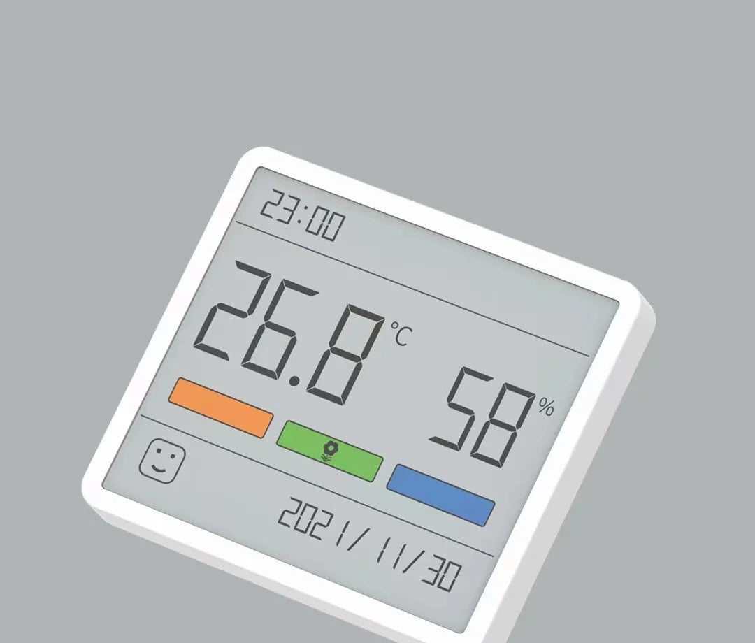 Mini digital clock hygrometer with ABS body and PMMA screen, showing temperature and humidity on a white background