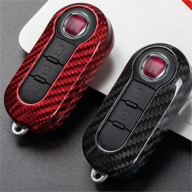 Carbon fibre and glass fibre replacement shell for a car remote key fob.
