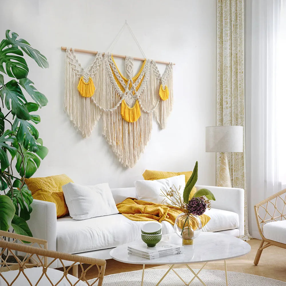Hand-made cotton Nordic tapestry wall hanging in creamy white with yellow accents, 120cm by 95cm