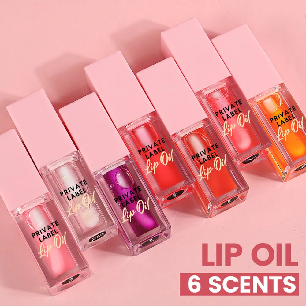 Set of six women's transparent lip gloss tubes in different colours and flavours