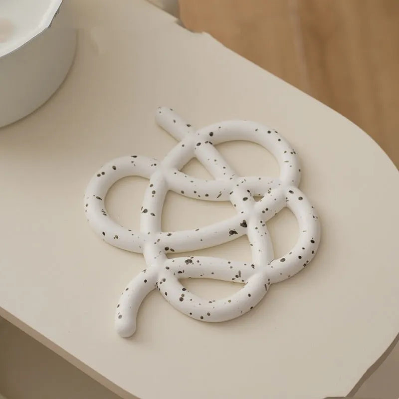 Ceramic heat proof mat with irregular shape in modern simplicity style