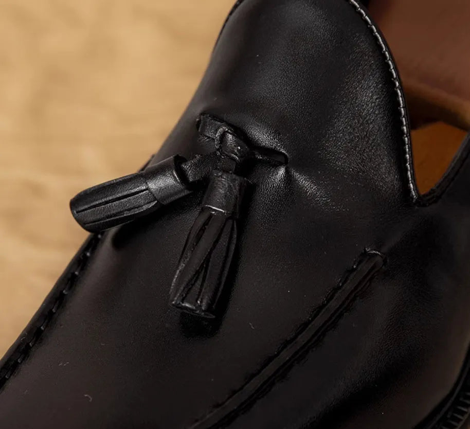 Men's black genuine leather slip-on loafers with fringed design and rubber sole